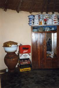 Cabinet with crockery and bottles