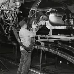 American Motors Corporation factory employee at work
