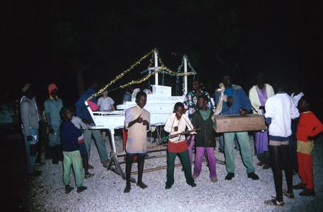 Young People with Festive Boat Made for Christmas