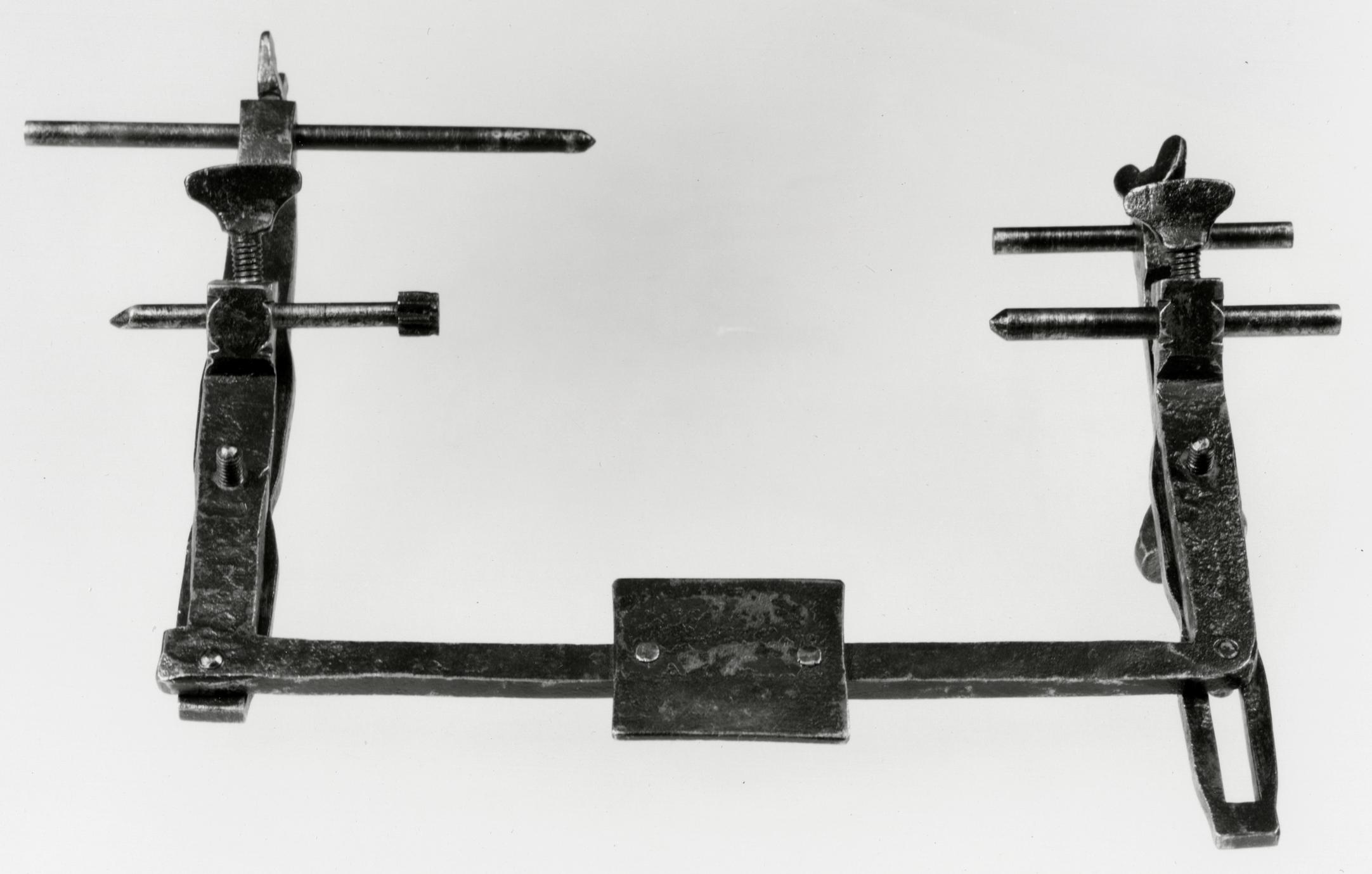 Black and white photograph of a depth gauge ("deepening" or "pitching" tool).