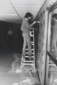 Student painting hallway that became known as "Macaroni Hall"