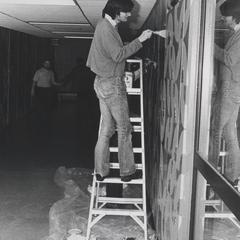 Student painting hallway that became known as "Macaroni Hall"