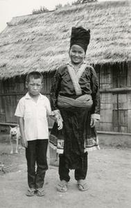 A Blue Hmong (Hmong Njua) woman with son in a Hmong village in the vicinity of Muang Vang Vieng in Vientiane Province