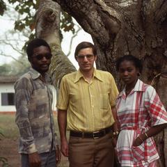 Sinon, Dick, and Nike (Komolafe) Afolabi by tree