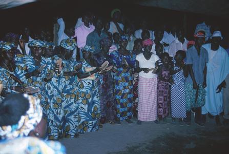 Women Singing and Clapping at the Naming Ceremony
