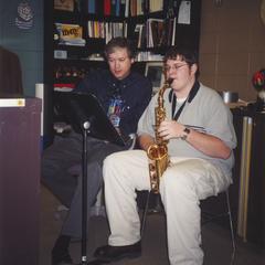 Music professor Dan Ackley with student