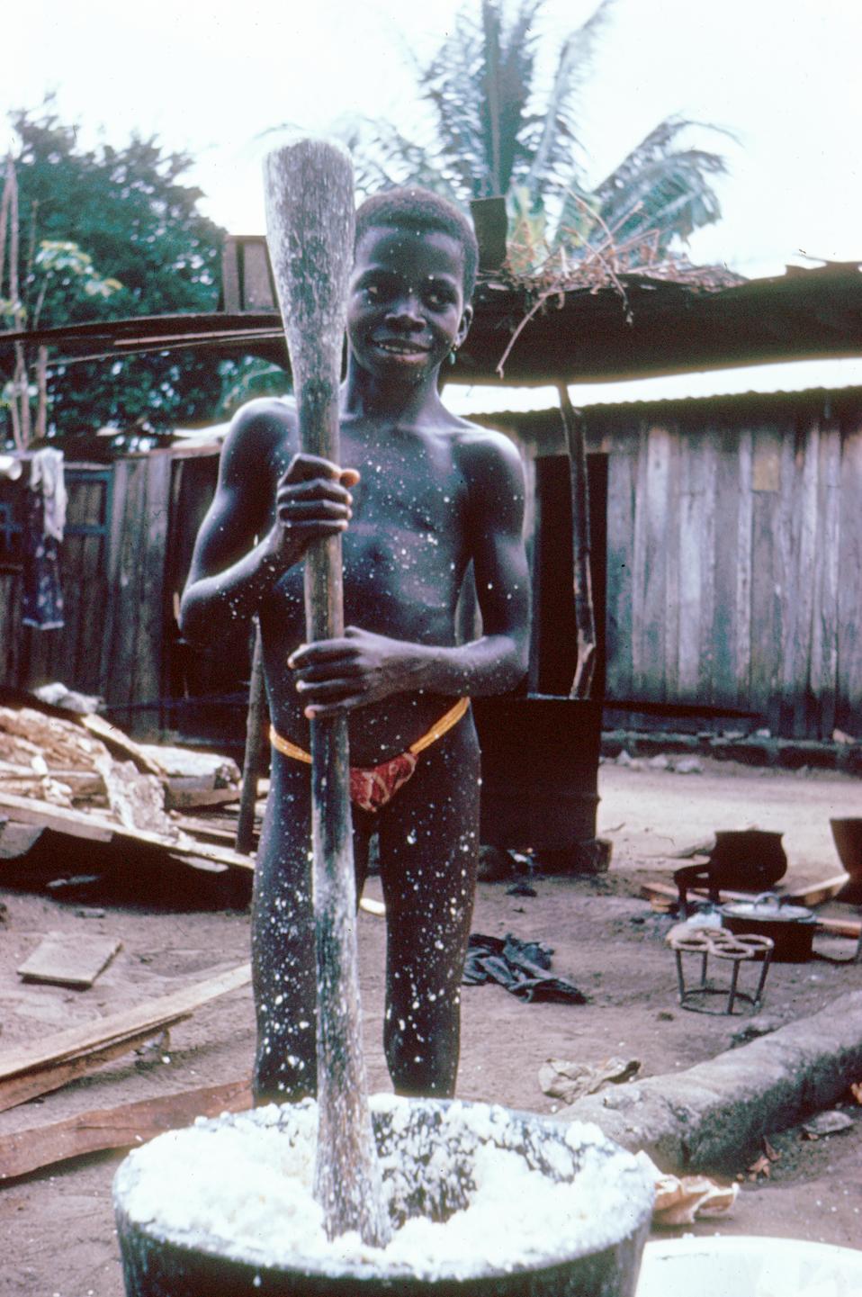 Ebrie Girl Preparing Cassava (Manioc) - UWDC - UW-Madison Libraries