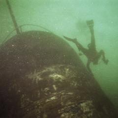 Scuba diver near the sunken America