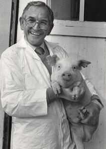 Jan Rapacz holding pig