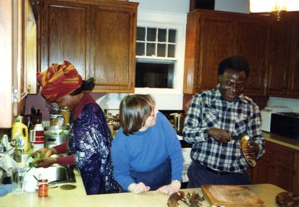 Nike, Folarin, and Trager making dinner at Trager's home