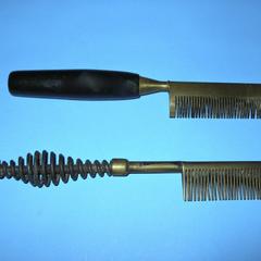 Hair straightening hot combs