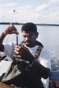 Theodore Willis weighing fish