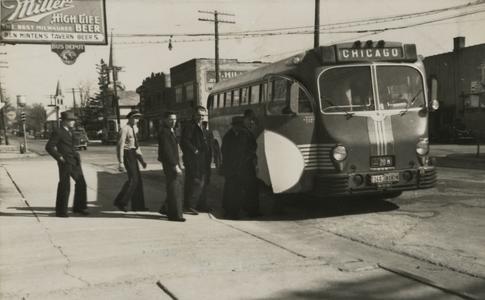 Gentlemen board a bus to Chicago in Kenosha