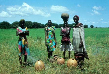 Women with Calabashes Posing in a Field