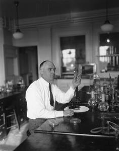 Fred, Edwin Broun working in his laboratory