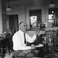 Fred, Edwin Broun working in his laboratory