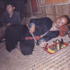 Naidan with opium pipe