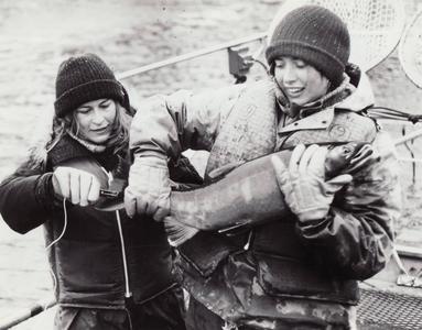 Cheryl Goodman and Kathy Hughes surveying salmon