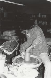 Ceramics student at pottery wheel