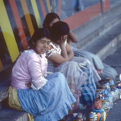 Women selling crafts in street, Mexico City