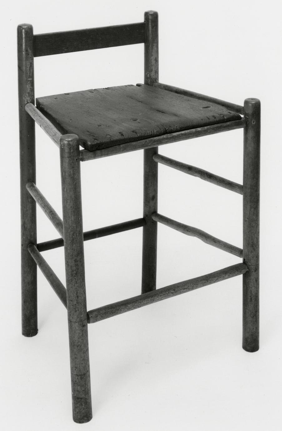 Black and white photograph of a shop chair.