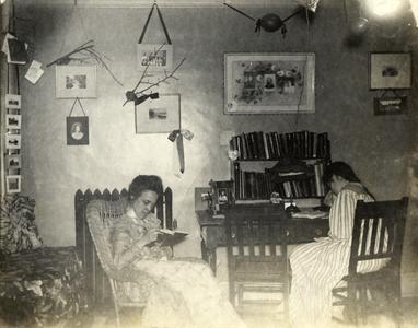 Lelia Bascom reading in dorm room