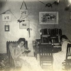Lelia Bascom reading in dorm room