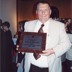 LaVerne Harrison with award, University of Wisconsin--Marshfield/Wood County, 2004