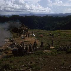 Firing artillery