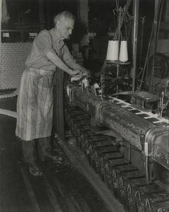 Simmons factory employee at work