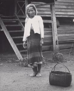 Laven woman with basket in Houei Kong Cluster in Attapu Province