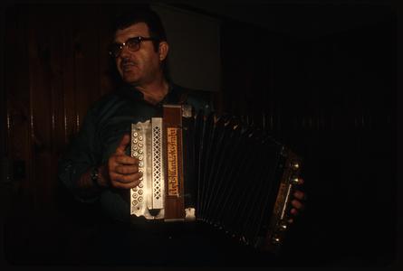 Tom Johanik plays a two-row button accordion