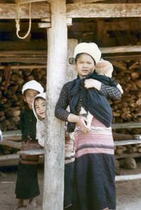 Mother with child in the Lu village of Ta Fa in Houa Khong Province