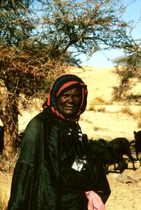 Nomadic Bella Woman Tending Goats
