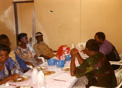 Group eating with the vice-chancellor of Obafemi Awolowo University.