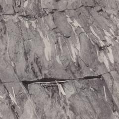 Crumpled granite dikes