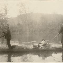 Son Carl, Aldo and "Flick" on scow, Current River Valley, December 1926