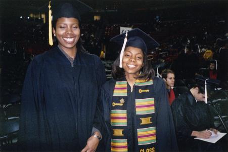 Two students at December 2003 graduation