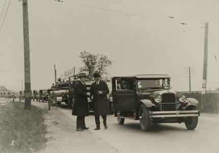 Charles W. Nash leads a parade of Nash automobiles