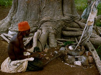 Earth Priest Making Offering Under a Baobab Tree
