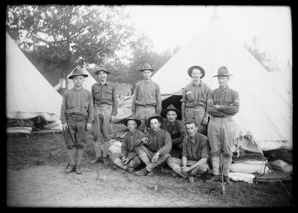 Soldiers in front of military tents