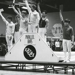 Men's gymnastics team receiving awards