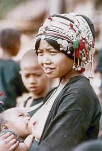 Akha woman nursing her baby at the village of Sobloi in Houa Khong Province