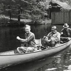 Ernest F. Swift canoeing on Brule River
