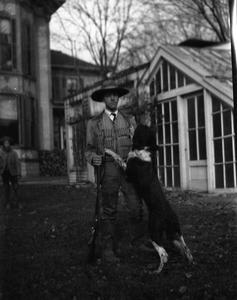 Aldo Leopold with dog and shotgun