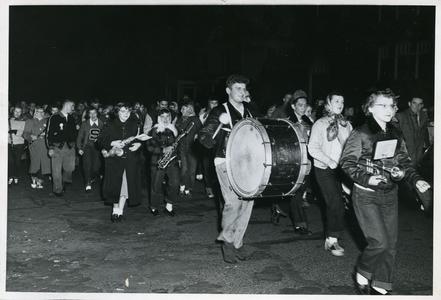 Stout Band performing at the Homecoming Torch Lite Parade