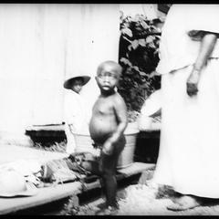 Livingston, British Honduras Boy having his shower bath