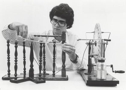 Student with laboratory equipment