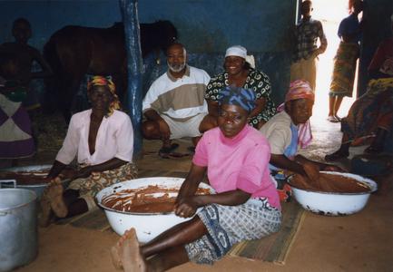 Jim Stills with shea butter makers
