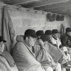 Baseball players in dugout